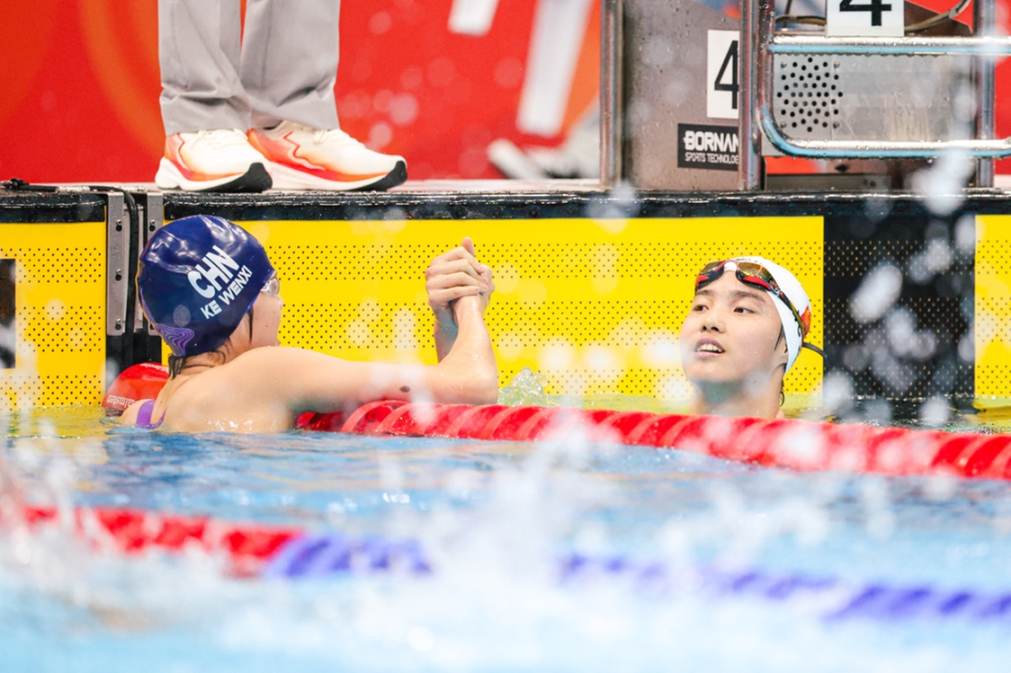Source image accompanying: Yu leaves the competition in her wake, claiming a third Games gold and another Asiad record in the 400 IM