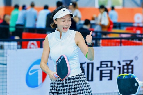Source image accompanying: Pickleball hits the mark with older Chinese players