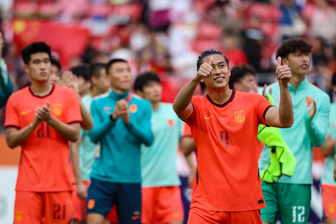 Source image accompanying: China tops 'group of death' to reach men's football quarters